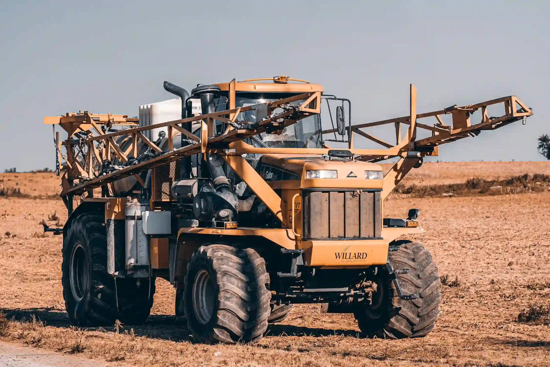 Yellow tractor in the field